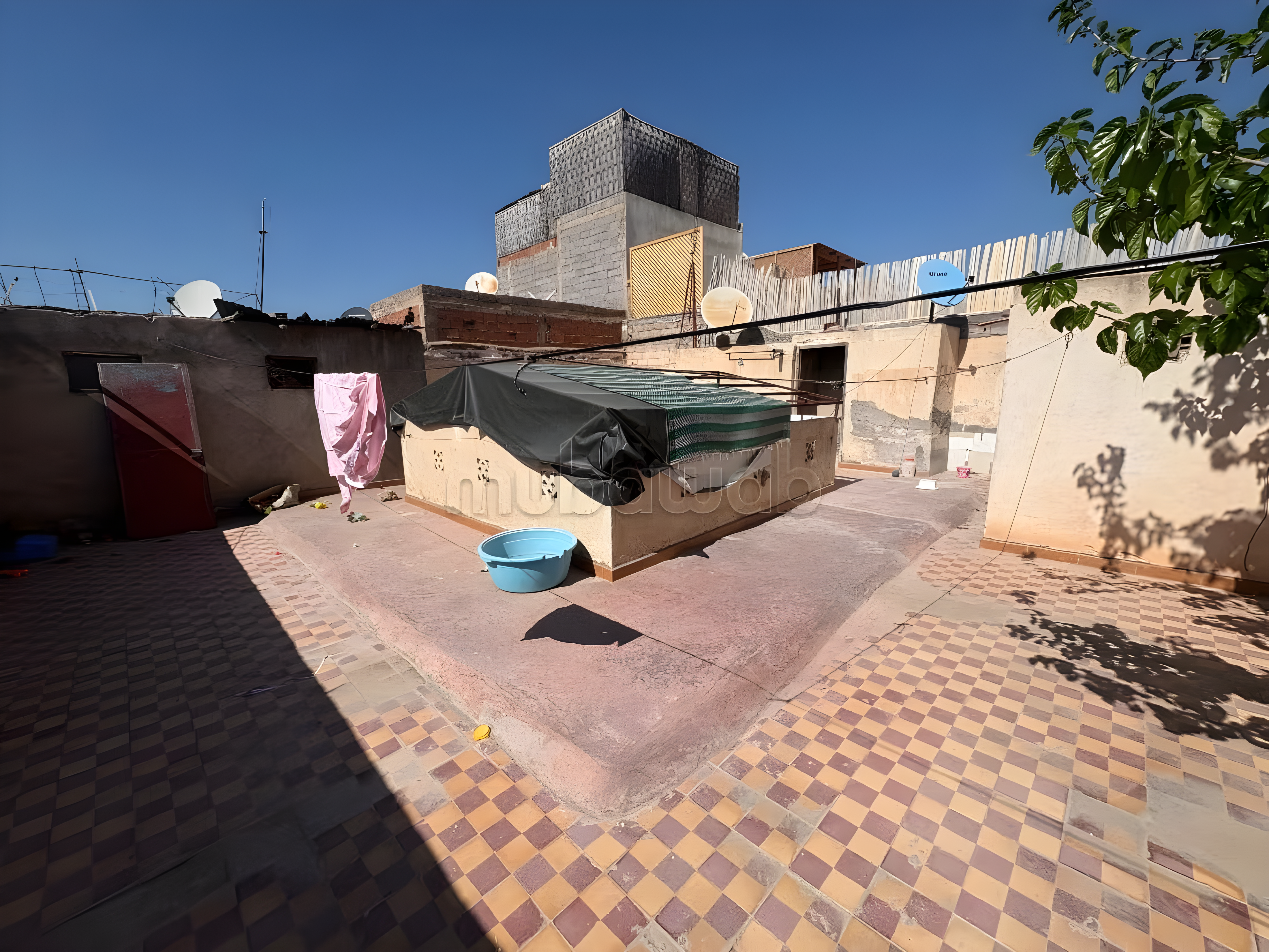 Rooftop of a guesthouse in Sidi Ben Slimane El Jazouli district, Marrakech.