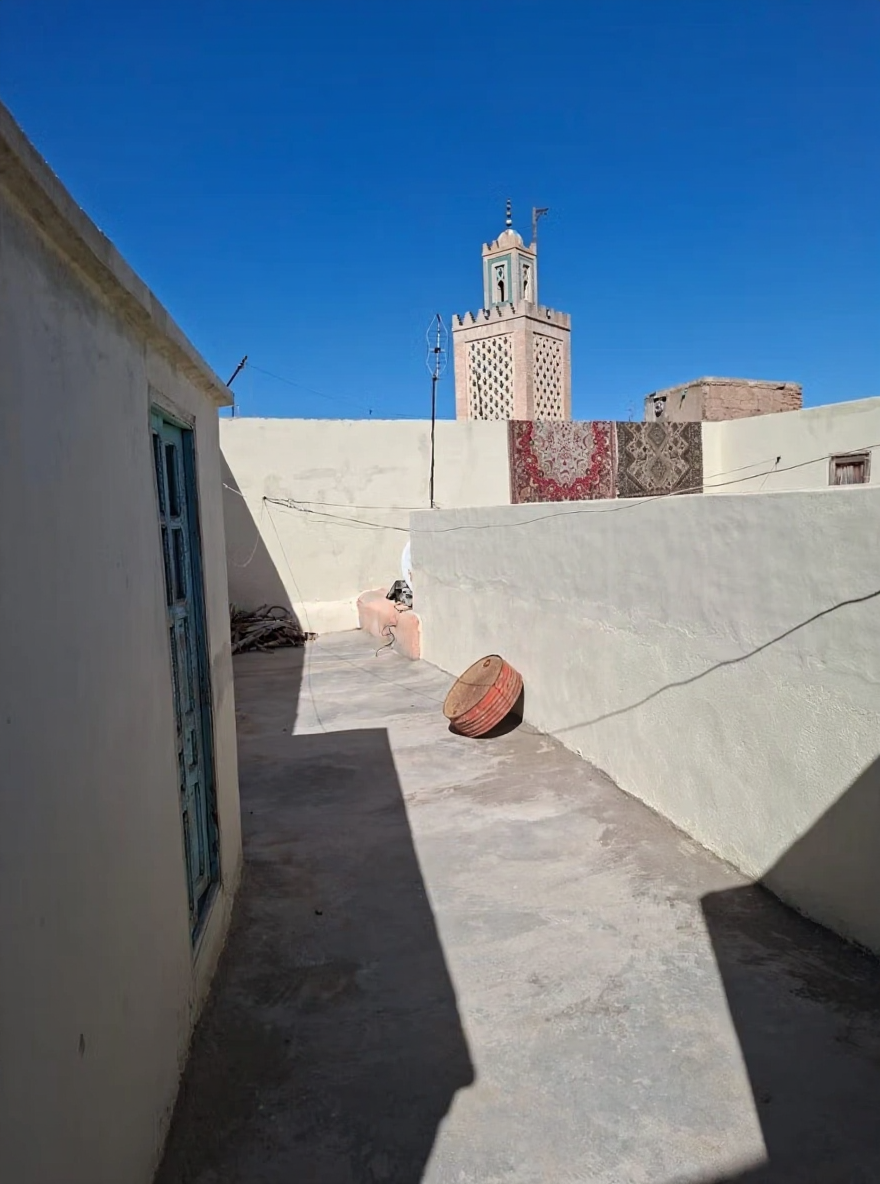 Rooftop view with mosque in Ben Saleh guesthouse.