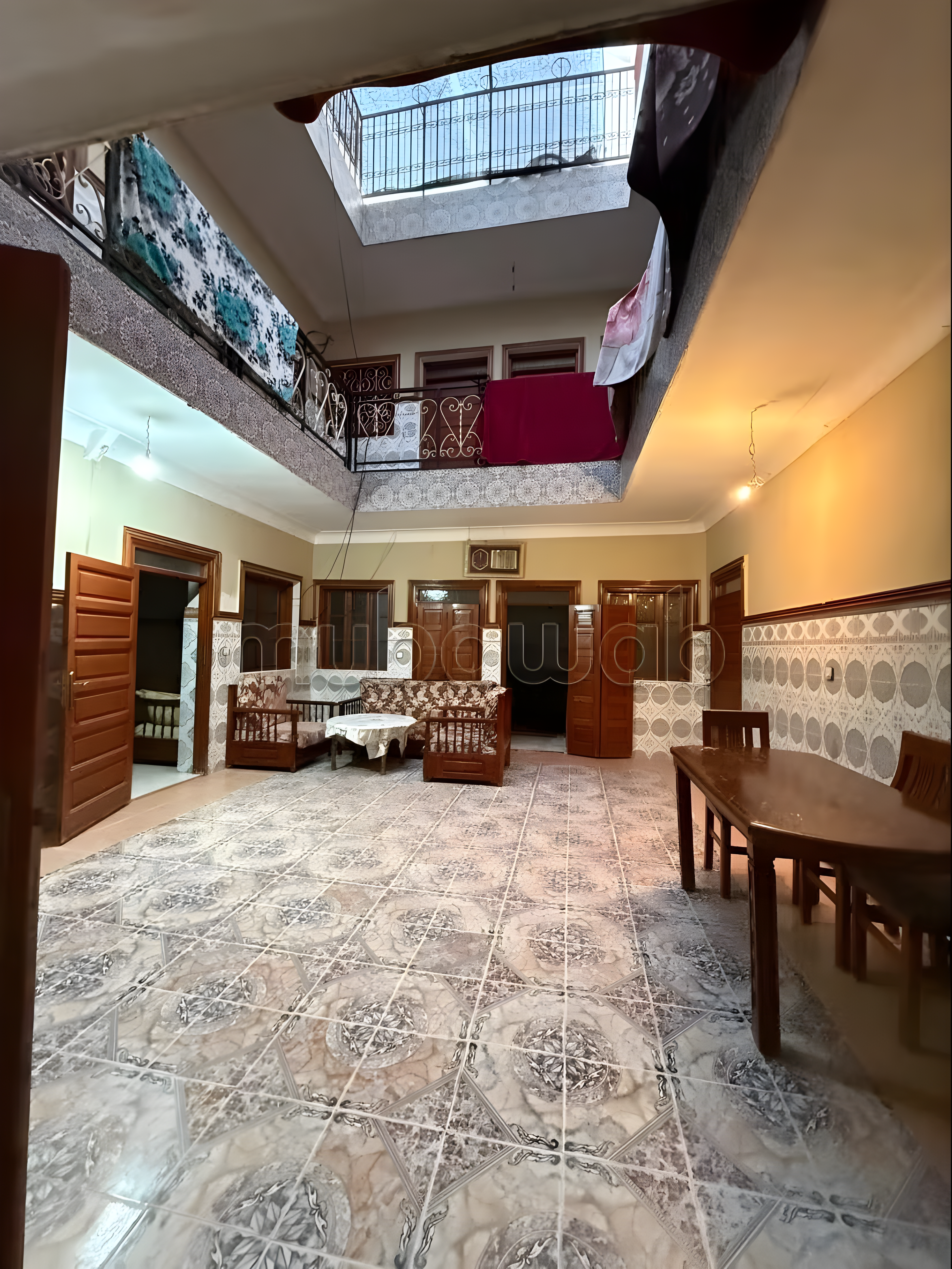 Courtyard in Arset Ihiri with Moroccan tile designs and patterned flooring