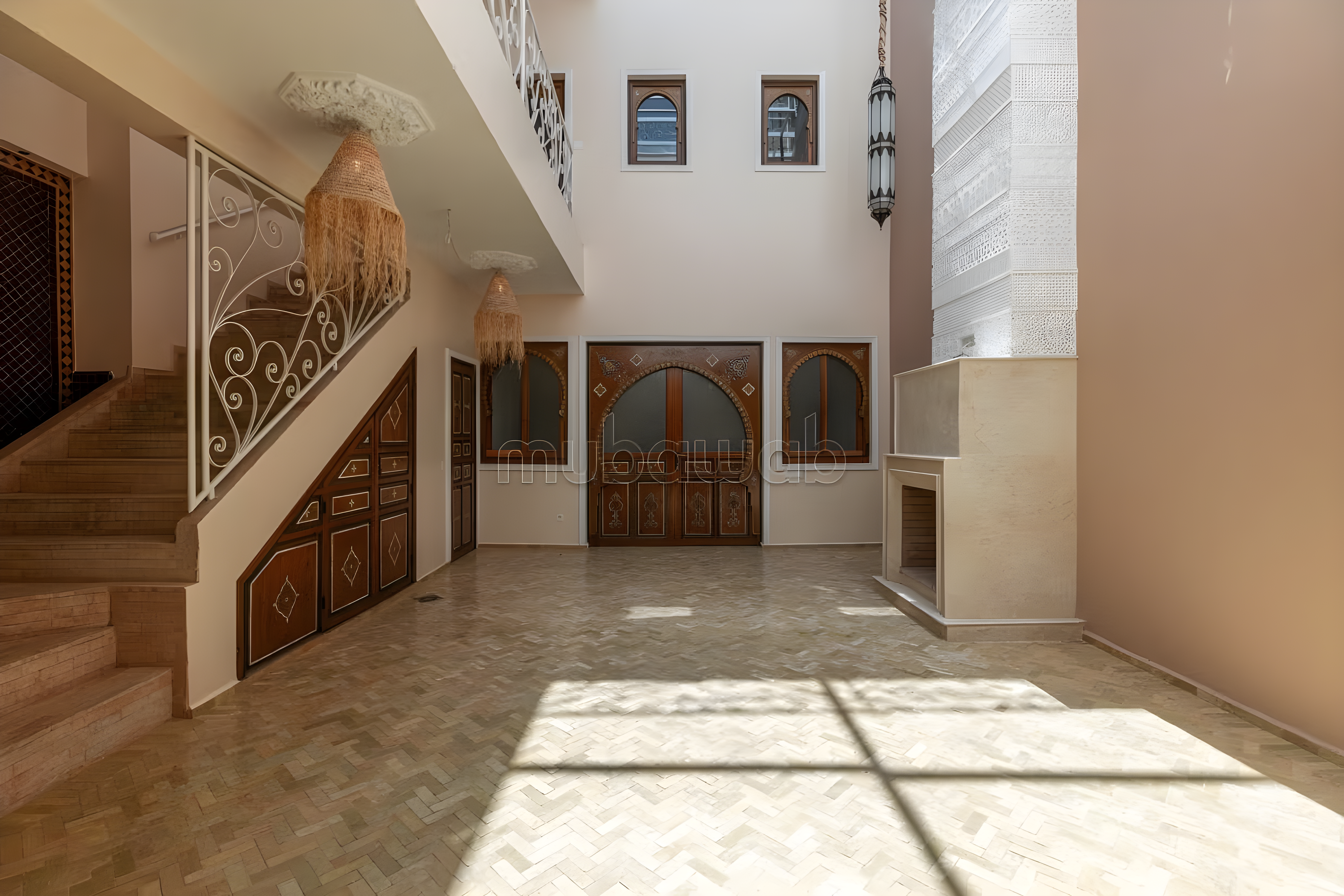 Courtyard of Arset El Houta guesthouse with traditional Moroccan elements.