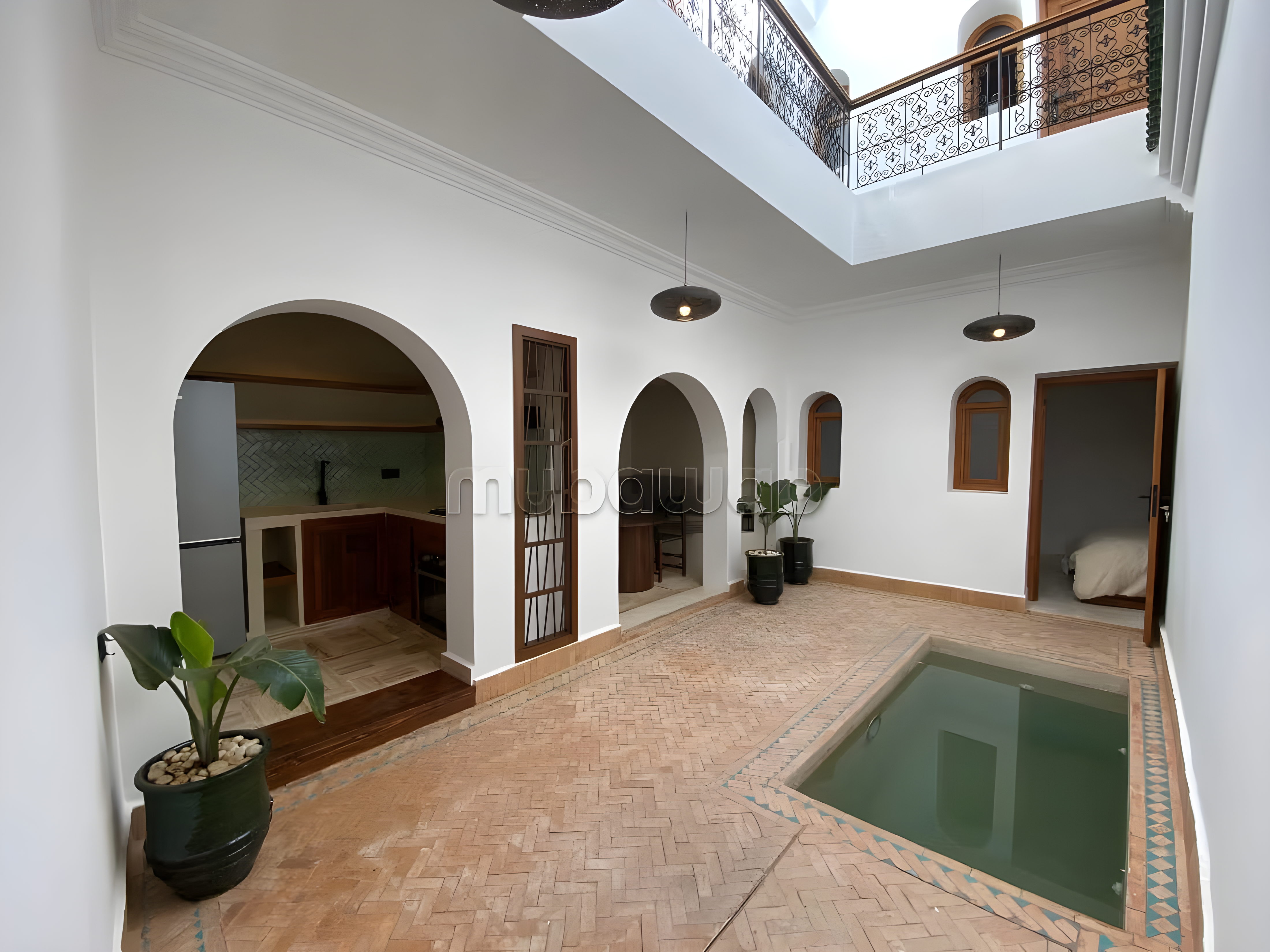 Courtyard with pool in a guesthouse in Arset Ben Chebli.