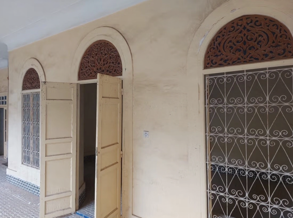 Beige facade with arched windows in Sidi Mimoun.